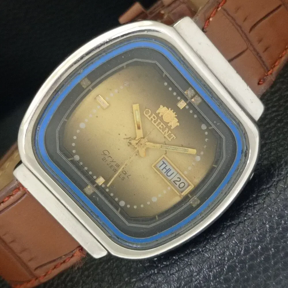 Vintage 1978 Oval Orient Automatic Mens Silver Watch W/daydate & Gold accents